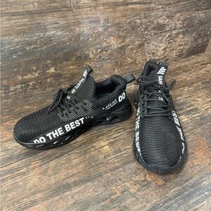 Black Athletic Safety Sneakers with White Text and Steel Toe for Work